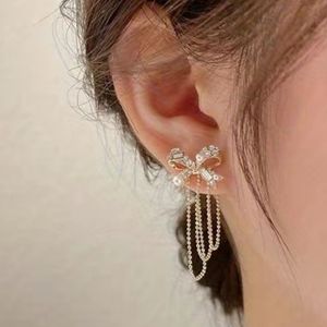 Brand new Bowknot  dangle earrings w/ Rhinestone and faux pearl